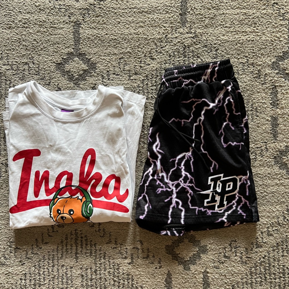 Inaka Power White Tee with Red Script and Brown Bear Graphic